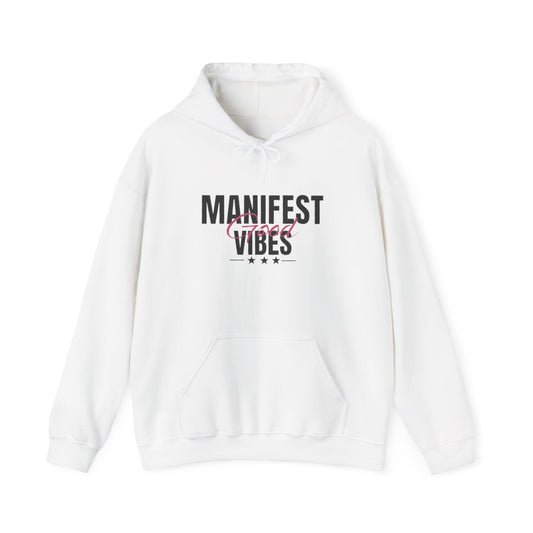 White hoodie with 'Manifest Good Vibes' text on a white background