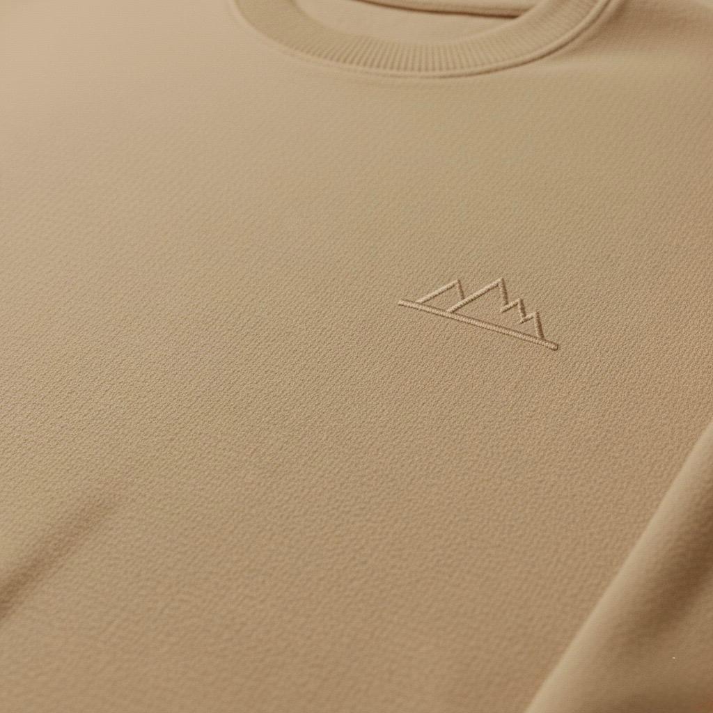 Sand beige hoodie with a subtle logo 